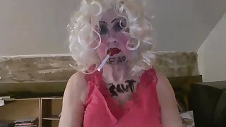 CD Sissy Sarah Millward knows her ID&comma; painless indicated by what's written on her face and chest - 'fag slut' -   painless she smokes&comma; wanks her clit&comma; and stuffs a dildo up her nasty foetus hole